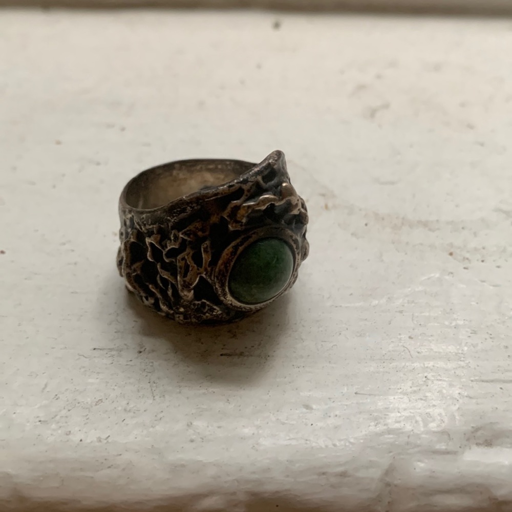 Textured silver ring with turquoise stone